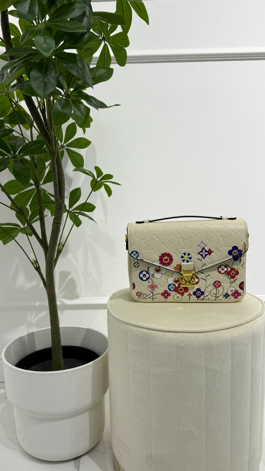 Louis Vuitton Pochette Métis Pelle Monogram Empreinte panna