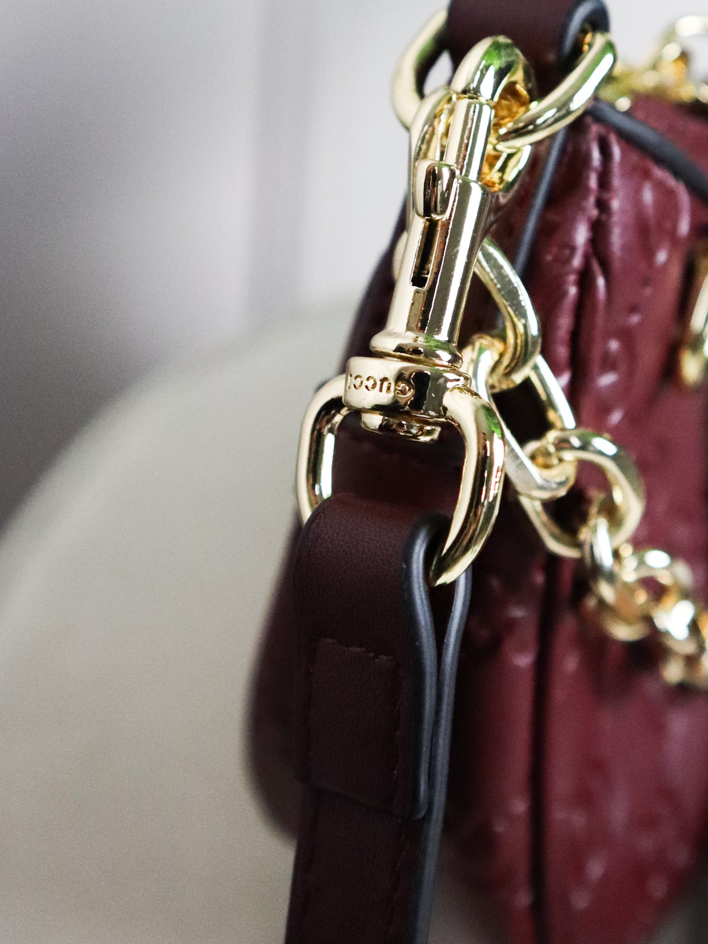 GUCCI Mini borsa a spalla GG Emblem bordeaux