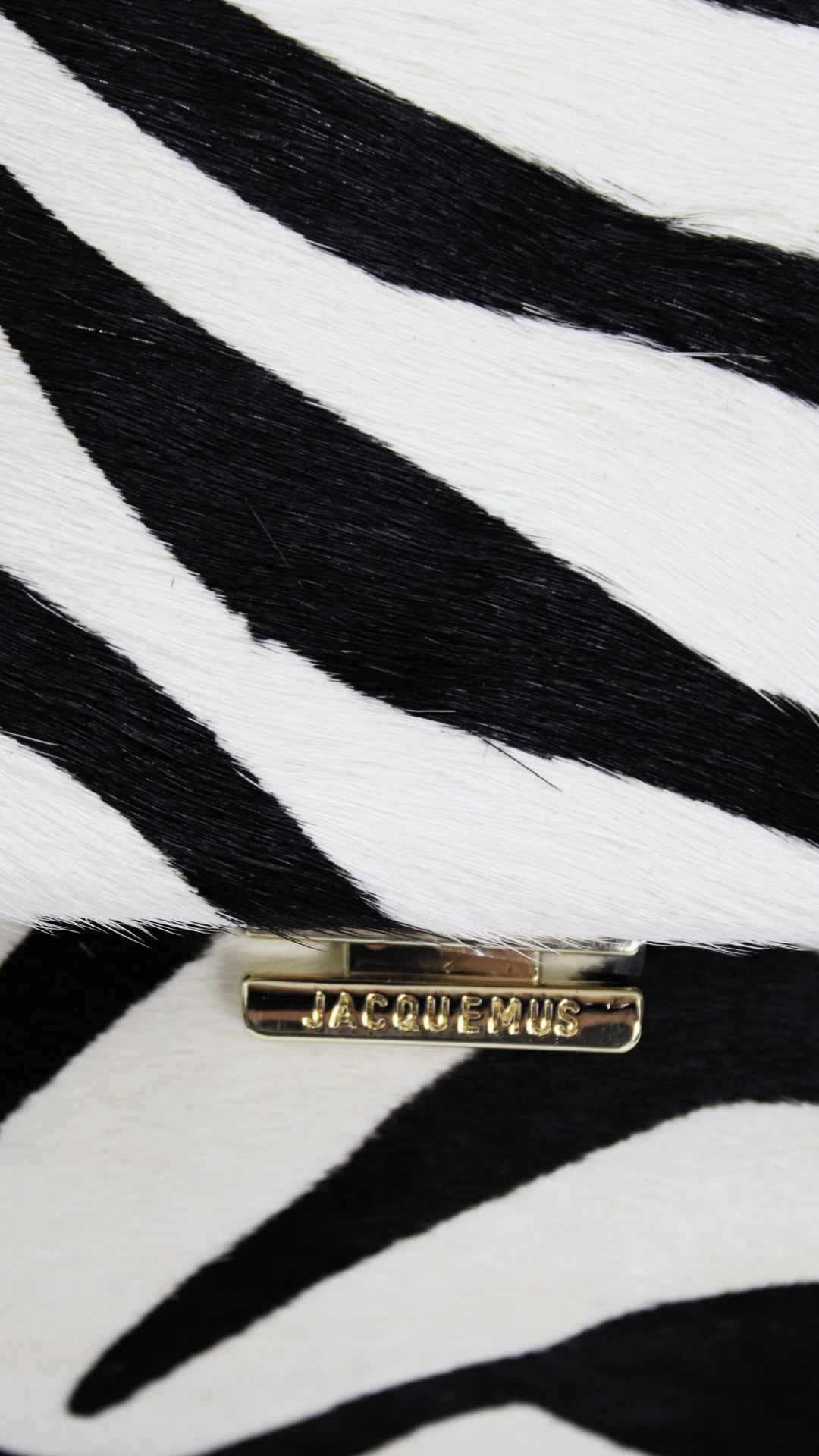 JACQUEMUS Pochette Luz in Camoscio zebrata