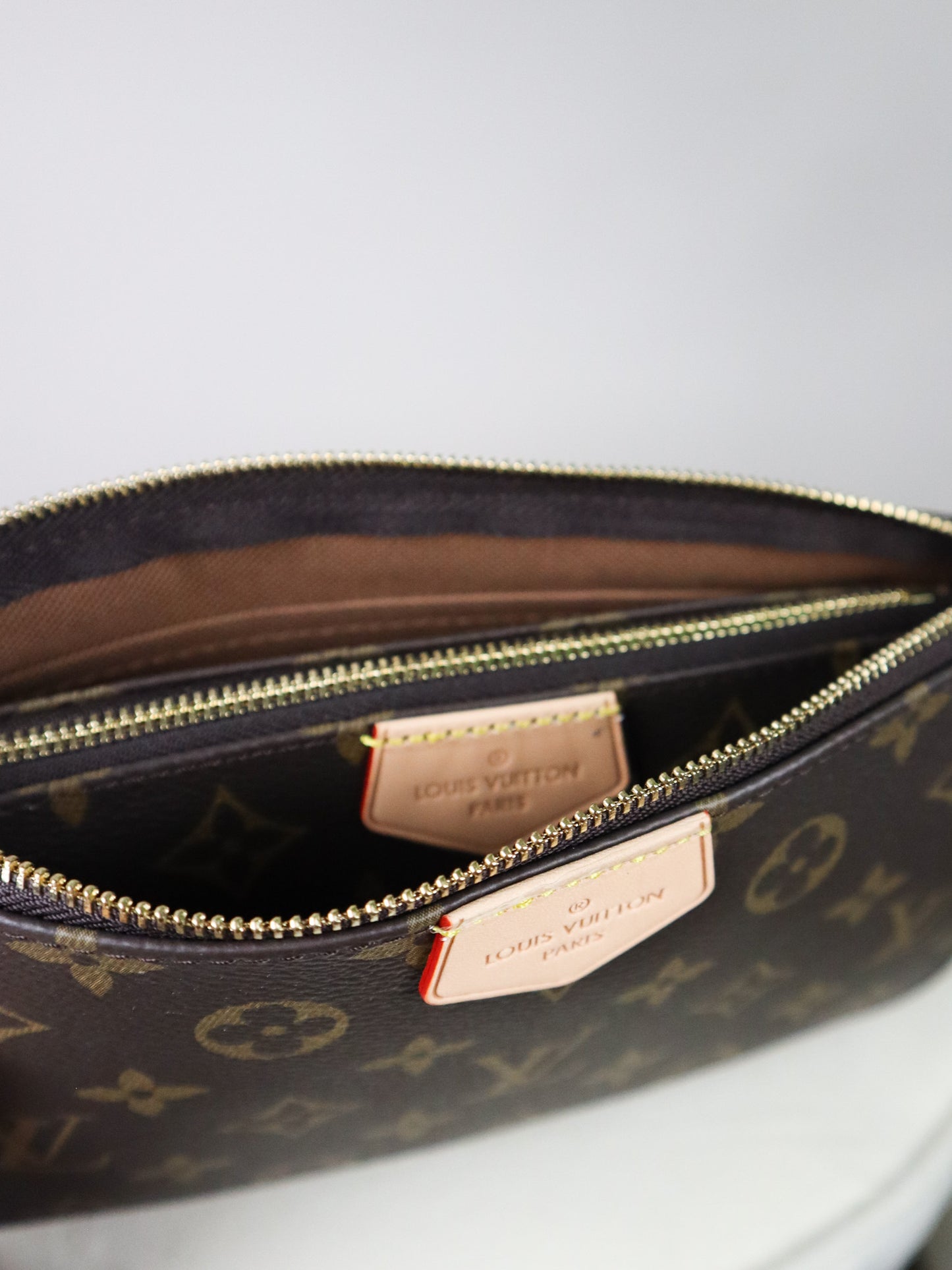 Louis Vuitton Multipochette in Tela monogram