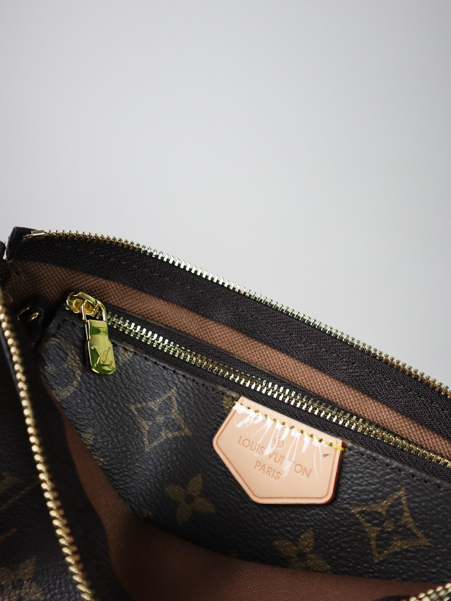 Louis Vuitton Multipochette in Tela monogram