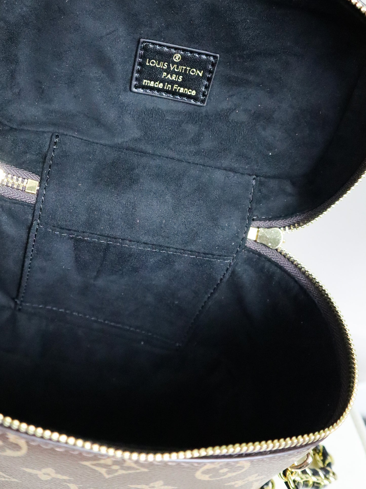 Louis Vuitton Pochette Vanity con catenella Monogram Reverse Canvas